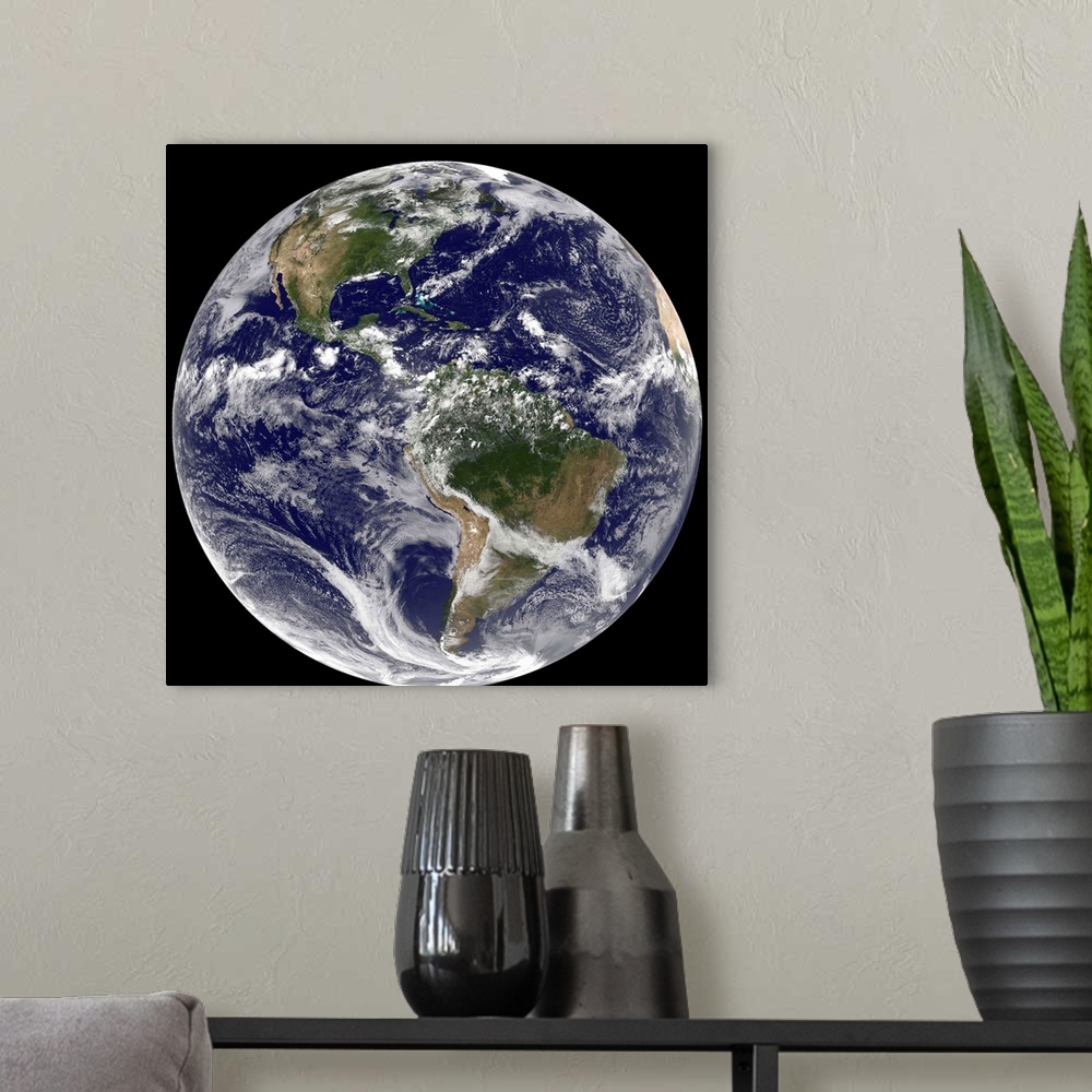 A modern room featuring Full Earth showing North and South America on July 14, 2010.
