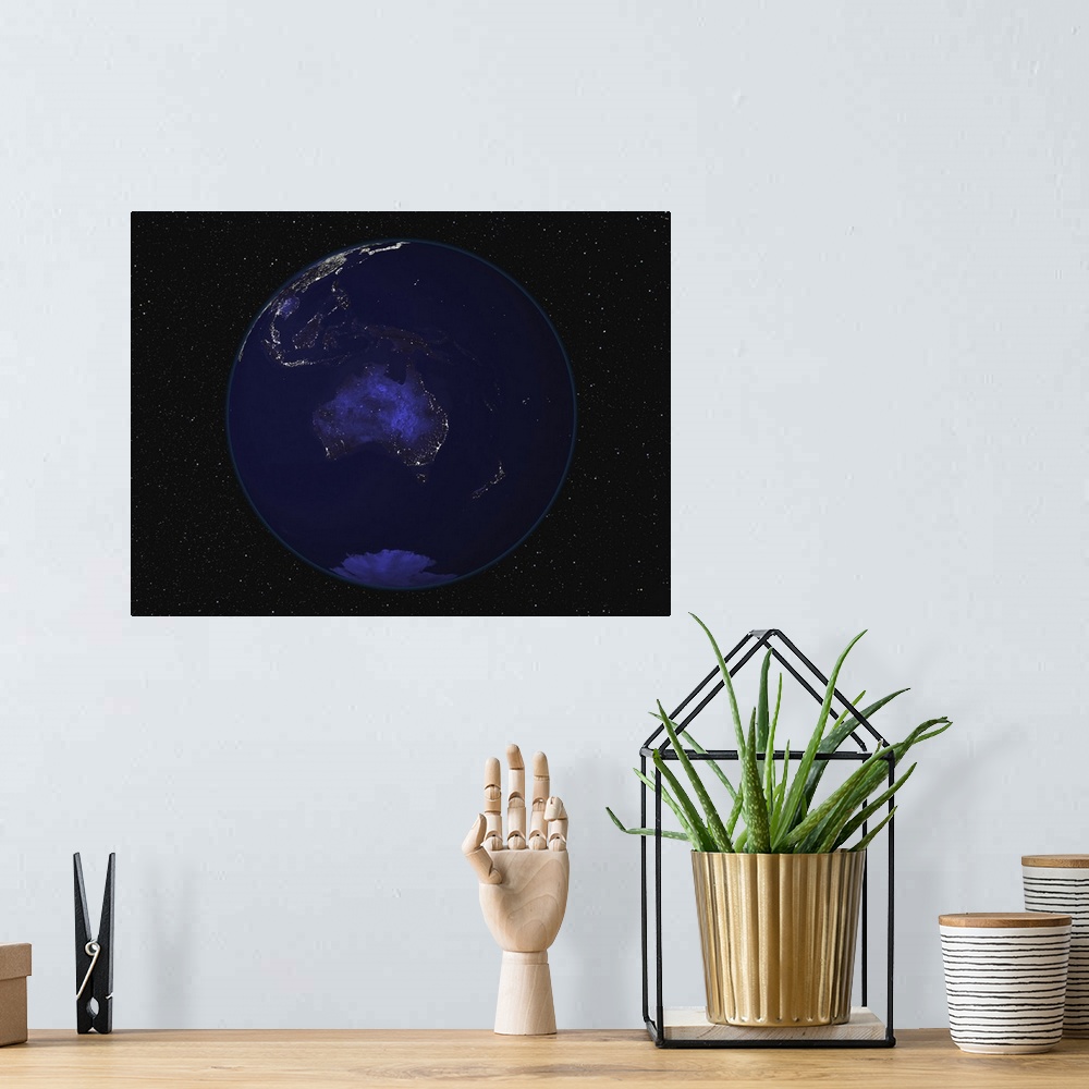 A bohemian room featuring Fully dark city lights image of Earth centered on Australia and Oceania