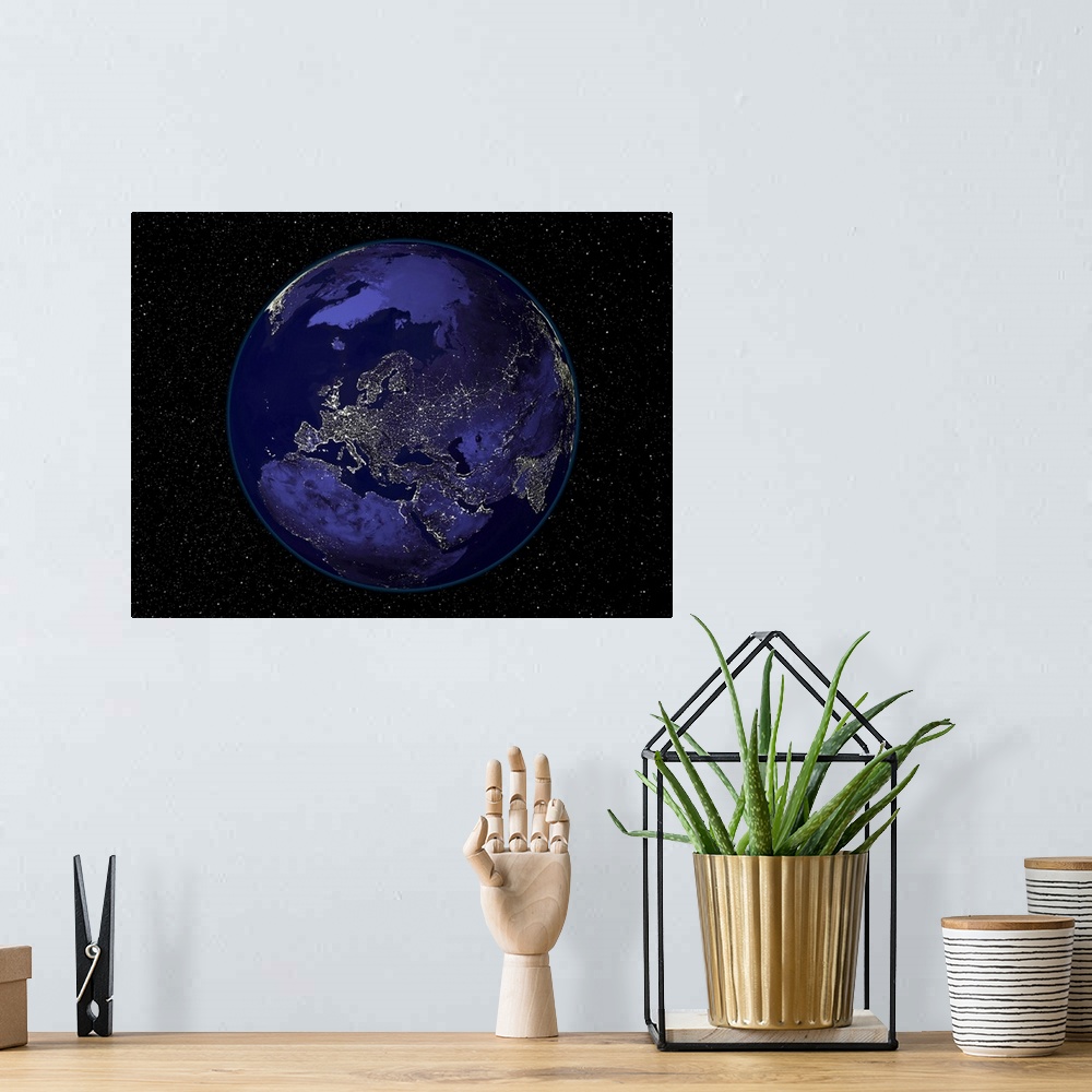 A bohemian room featuring Fully dark city lights image of Earth centered on Europe