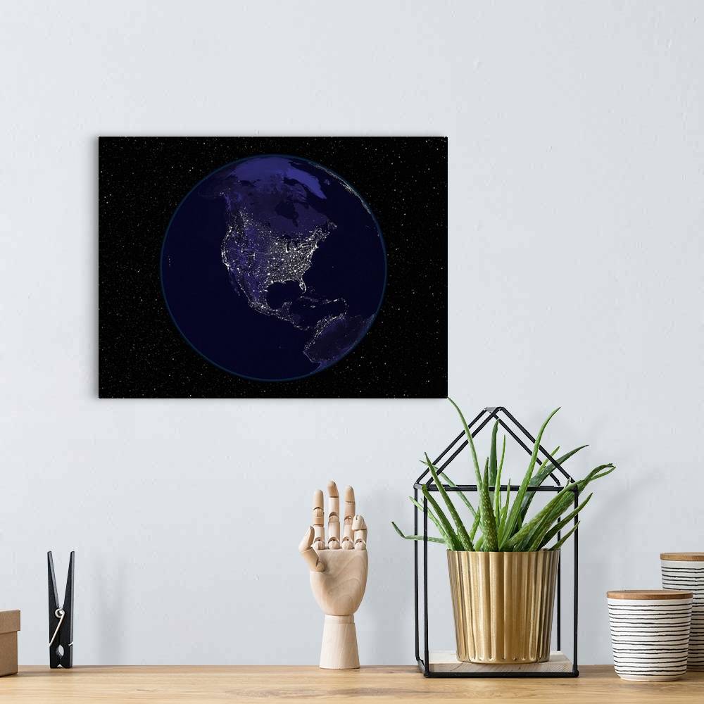A bohemian room featuring Fully dark city lights image of Earth centered on North America