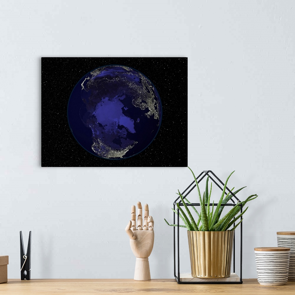 A bohemian room featuring Fully dark city lights image of Earth centered on the North Pole