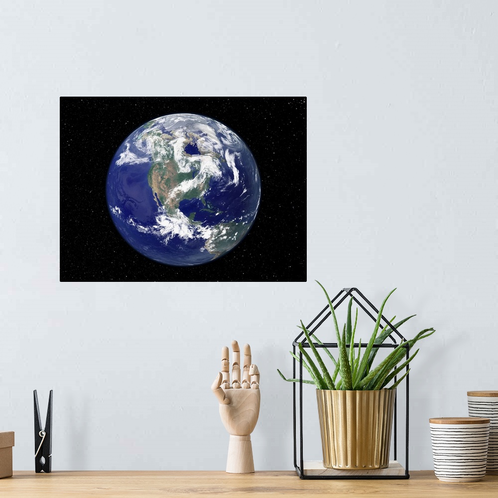 A bohemian room featuring Photograph of the Earth as seen from space, where the continent and weather patterns are clearly ...