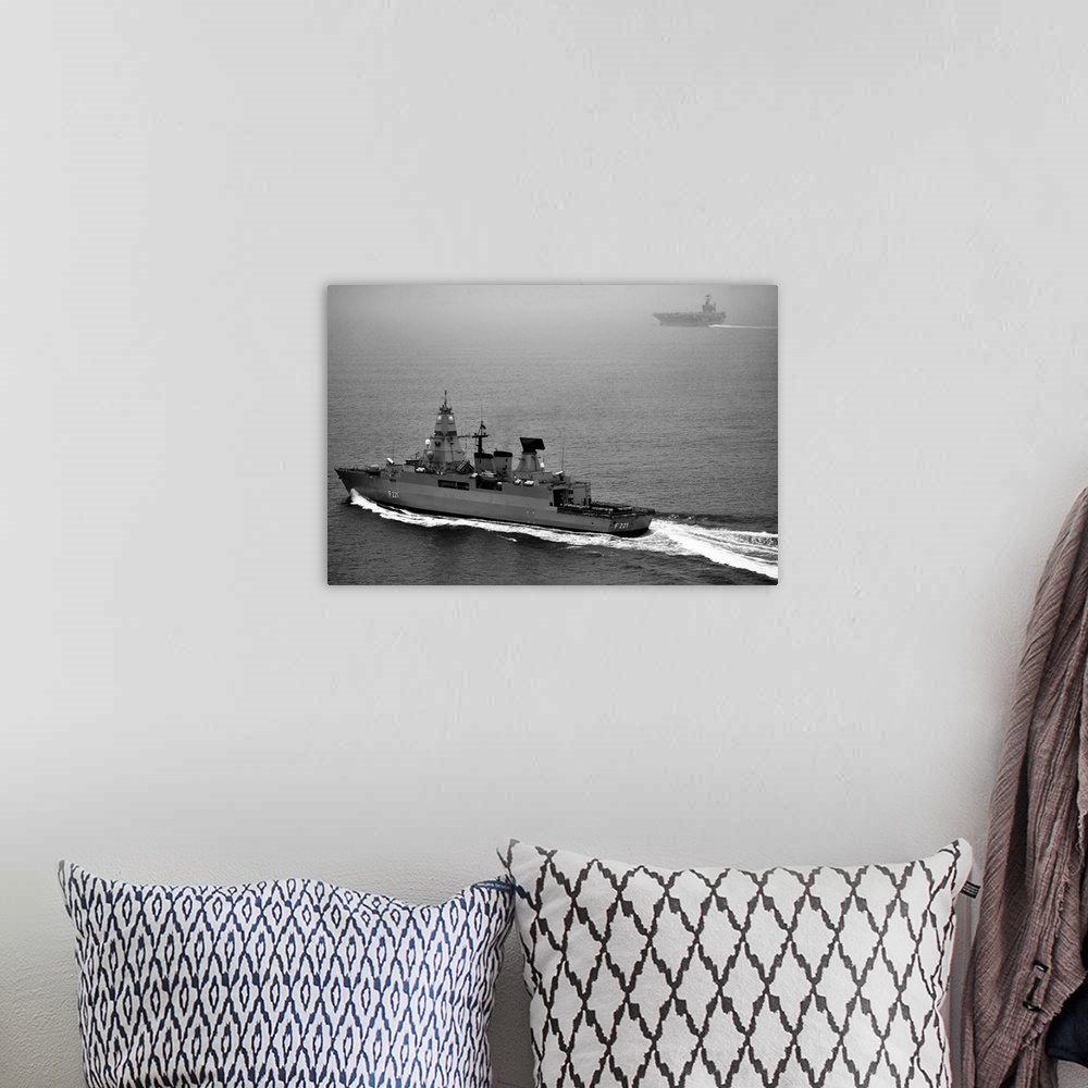A bohemian room featuring German navy frigate FGS Hessen cruises alongside USS Harry S. Truman.