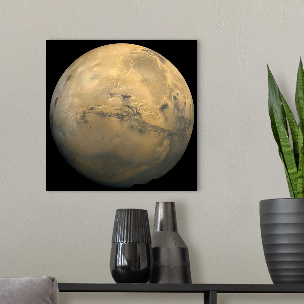 A modern room featuring Global mosaic of Mars. Visible in the center of this mosaic is the largest known chasm in the sol...