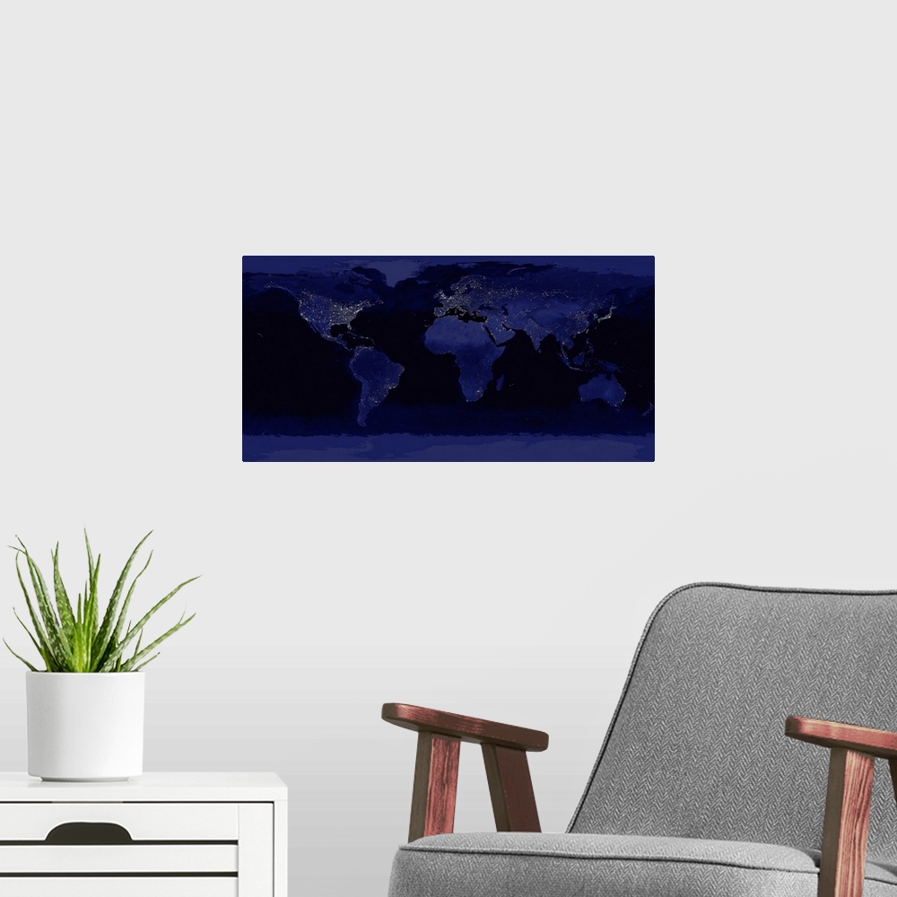 A modern room featuring A large photograph of the world taken at night showcasing city lights.