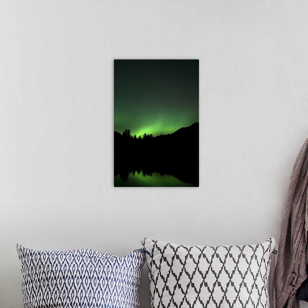 A bohemian room featuring Green Aurora above Kincolith River
