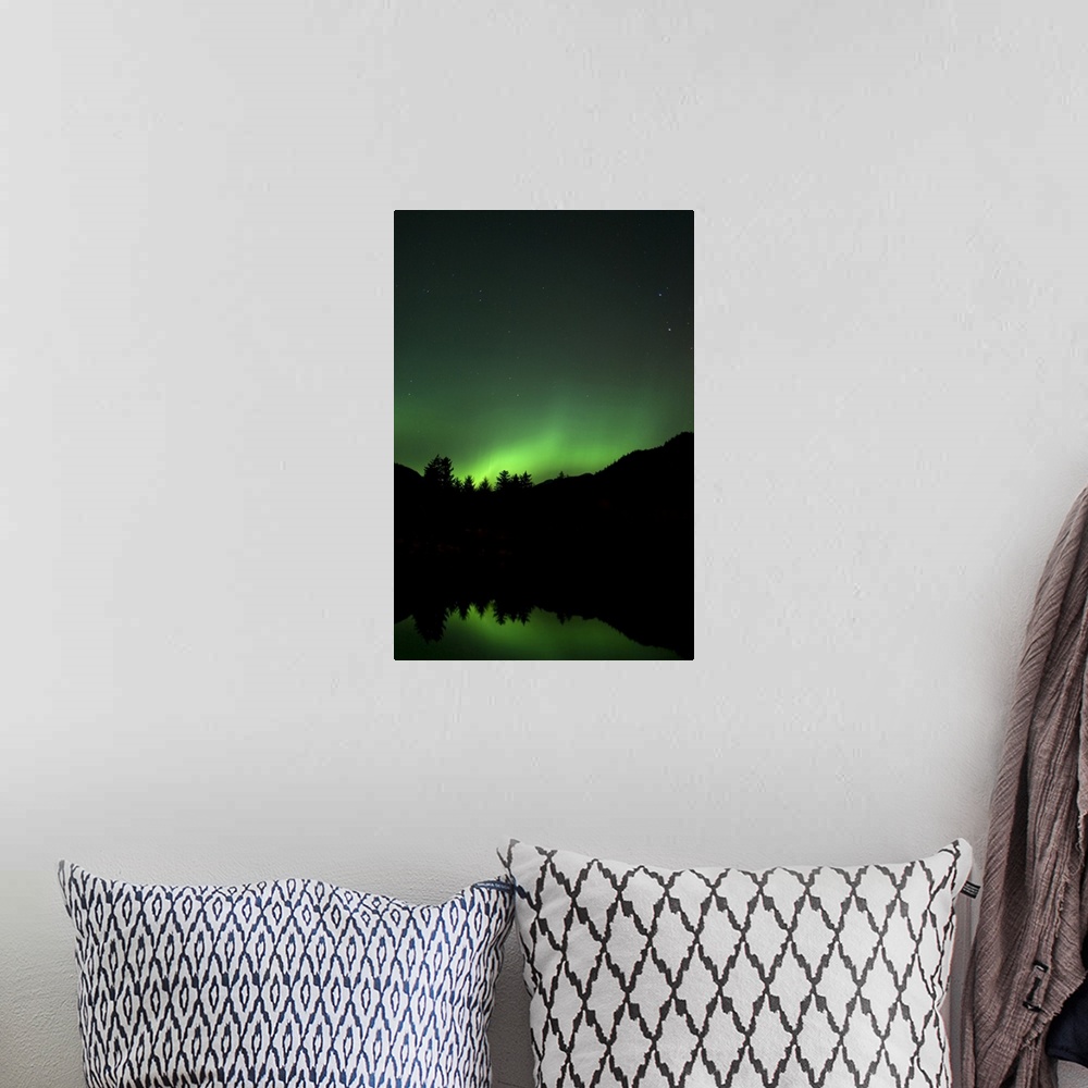 A bohemian room featuring Green Aurora above Kincolith River