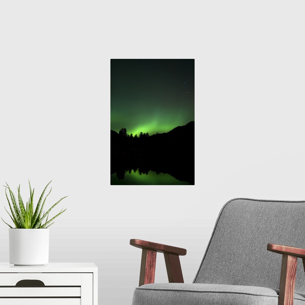A modern room featuring Green Aurora above Kincolith River