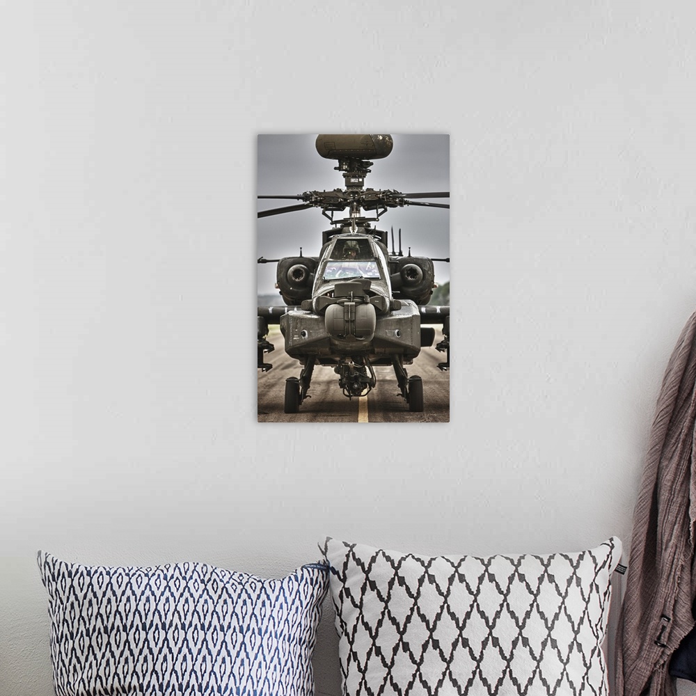 A bohemian room featuring High dynamic range image of an AH-64 Apache helicopter on the runway during flight operations, Co...
