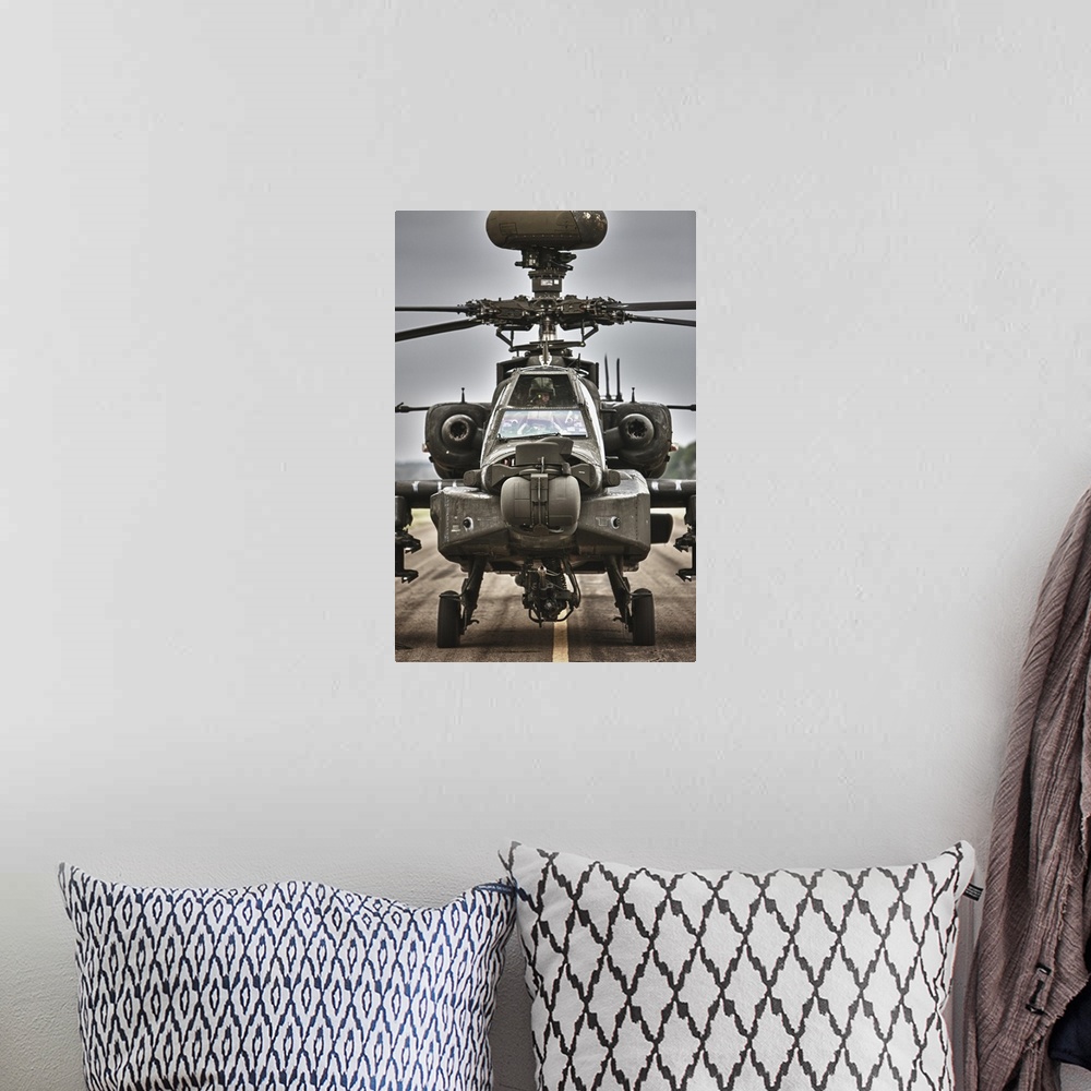 A bohemian room featuring High dynamic range image of an AH-64 Apache helicopter on the runway during flight operations, Co...