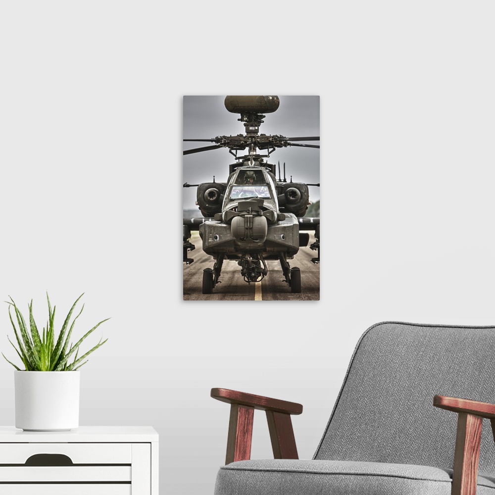 A modern room featuring High dynamic range image of an AH-64 Apache helicopter on the runway during flight operations, Co...