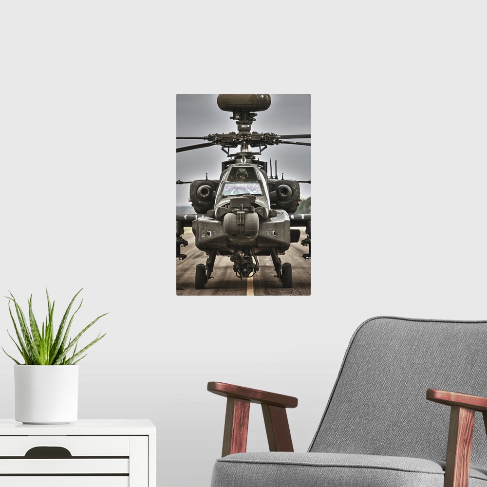 A modern room featuring High dynamic range image of an AH-64 Apache helicopter on the runway during flight operations, Co...