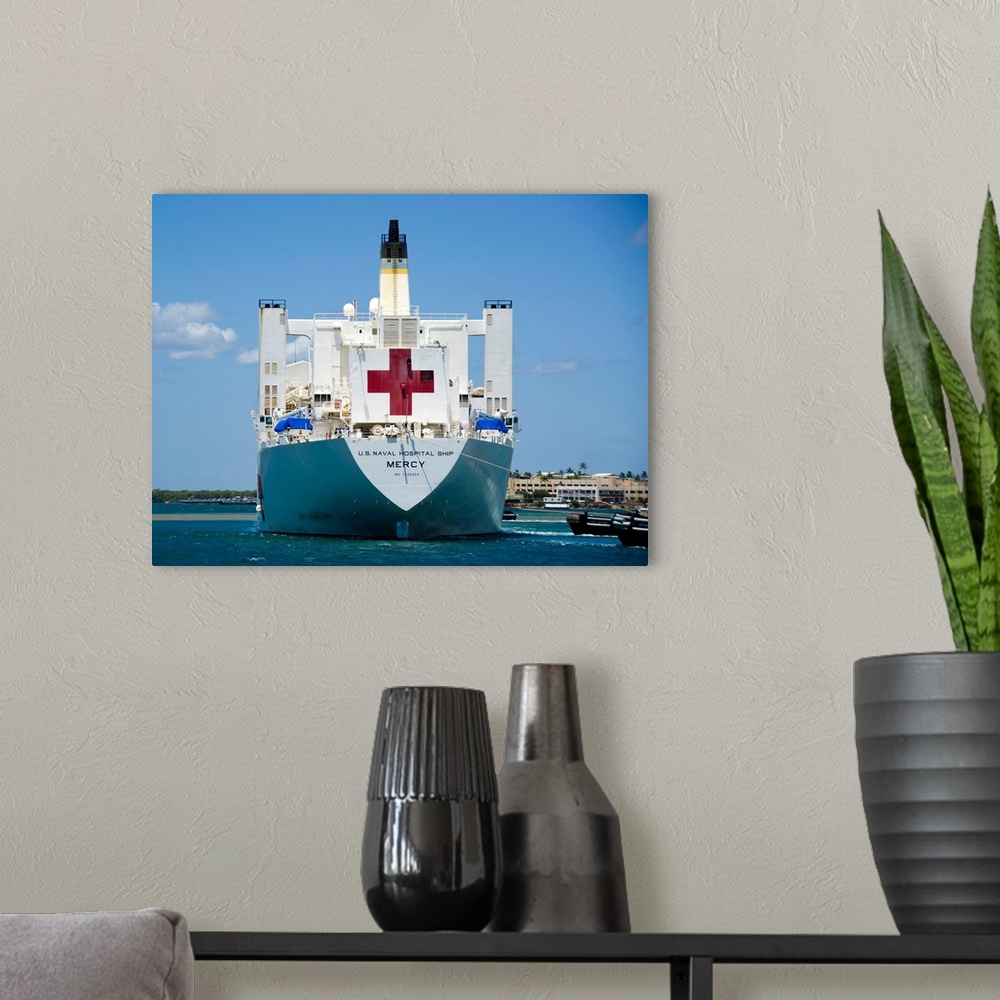 A modern room featuring Hospital ship USNS Mercy at Joint Base Pearl Harbor-Hickam in Hawaii.