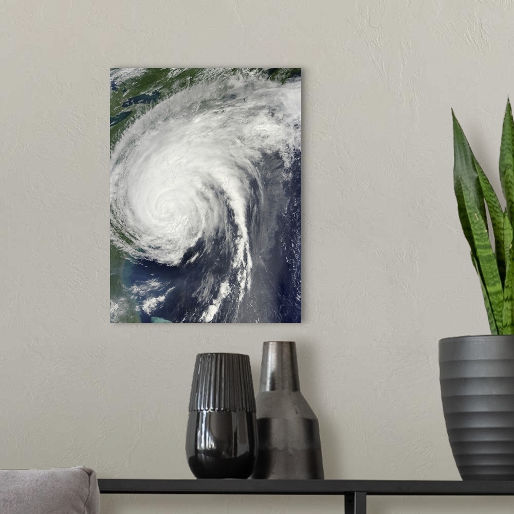 A modern room featuring August 27, 2011- Hurricane Irene over the eastern United States.