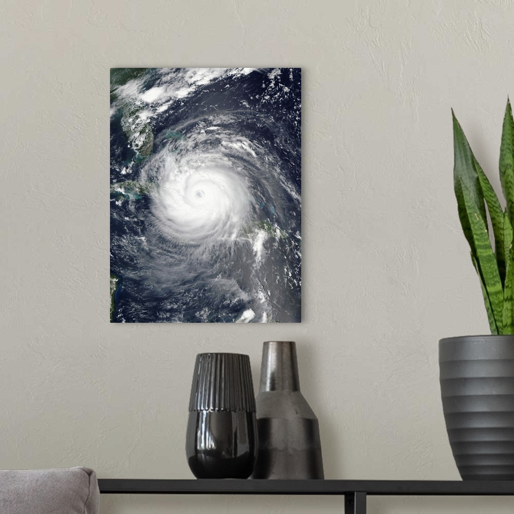 A modern room featuring Hurricane Irma over the Bahamas and Cuba.