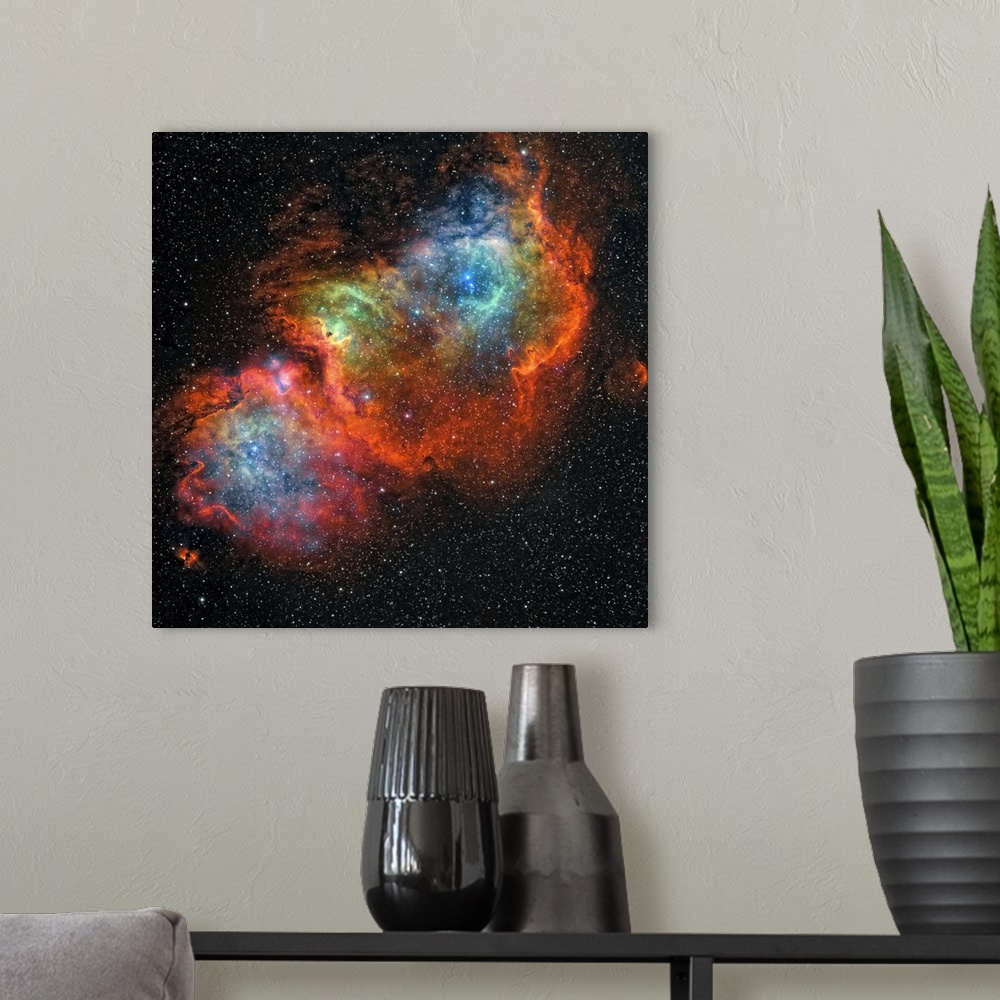 A modern room featuring Square, large wall hanging of the colorful Soul Nebula, surrounded by darkness and many stars.
