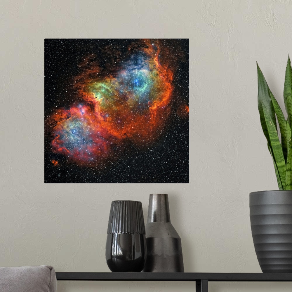 A modern room featuring Square, large wall hanging of the colorful Soul Nebula, surrounded by darkness and many stars.