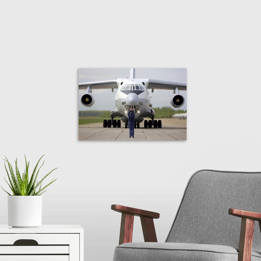 A modern room featuring IL-78M military tanker of the Russian Air Force taxiing at Dyagilevo Air Base, Russia.