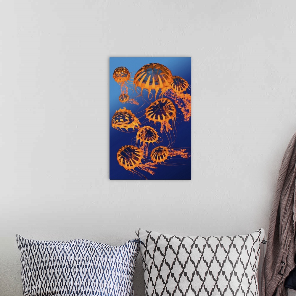 A bohemian room featuring Illustration of a group of golden jellyfish.
