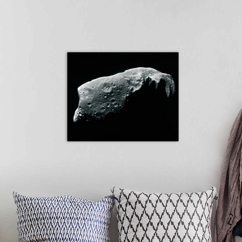 A bohemian room featuring Image of an asteroid