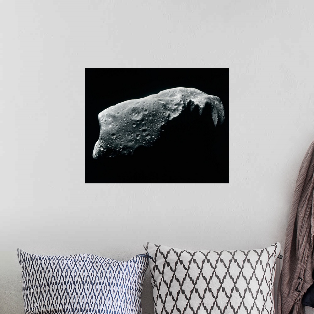 A bohemian room featuring Image of an asteroid