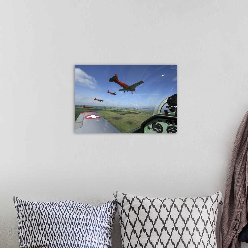 A bohemian room featuring Satenas, Sweden - Inside the Pilatus PC-7 turboprop trainer of the Swiss Air Force display team, ...