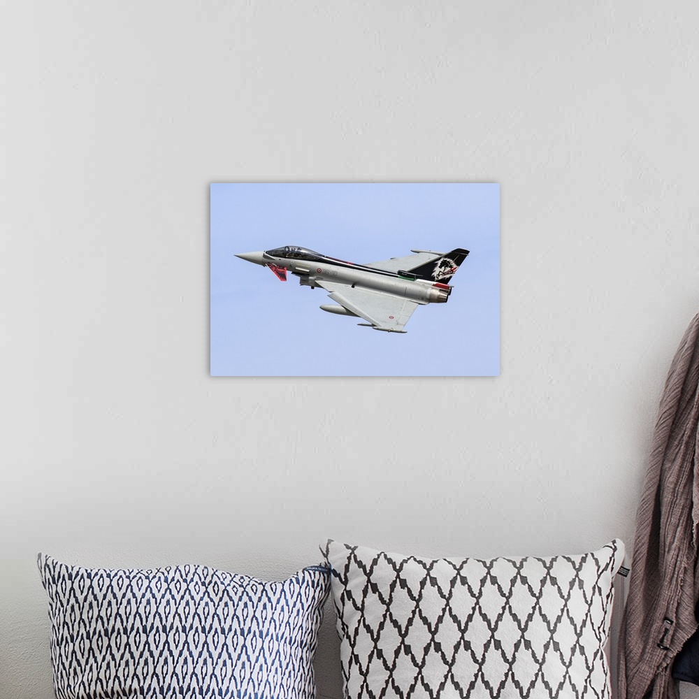A bohemian room featuring Italian Air Force F-2000A Typhoon taking off.