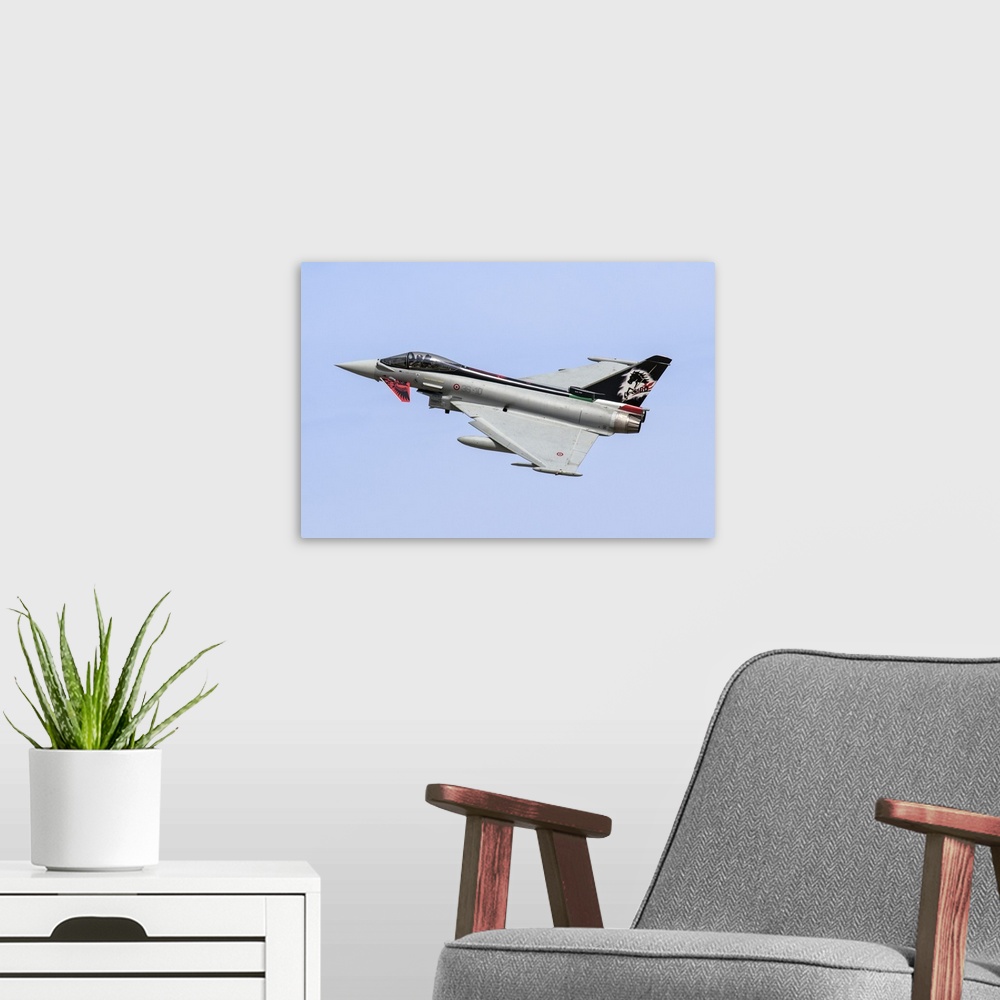 A modern room featuring Italian Air Force F-2000A Typhoon taking off.