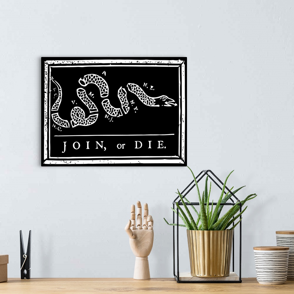 A bohemian room featuring The Join or Die print was a political cartoon created by Benjamin Franklin. The snake shown is se...