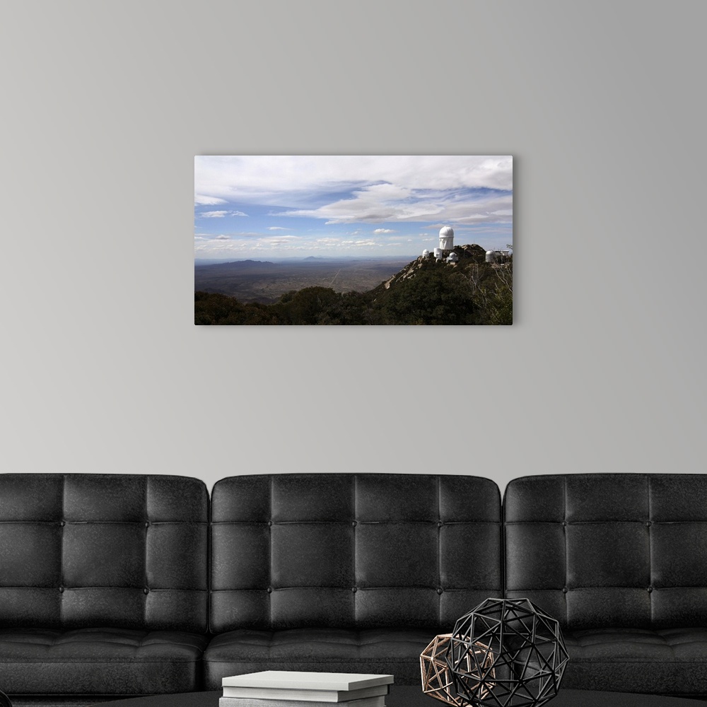 A modern room featuring Kitt Peak Observatory domes and surrounding area