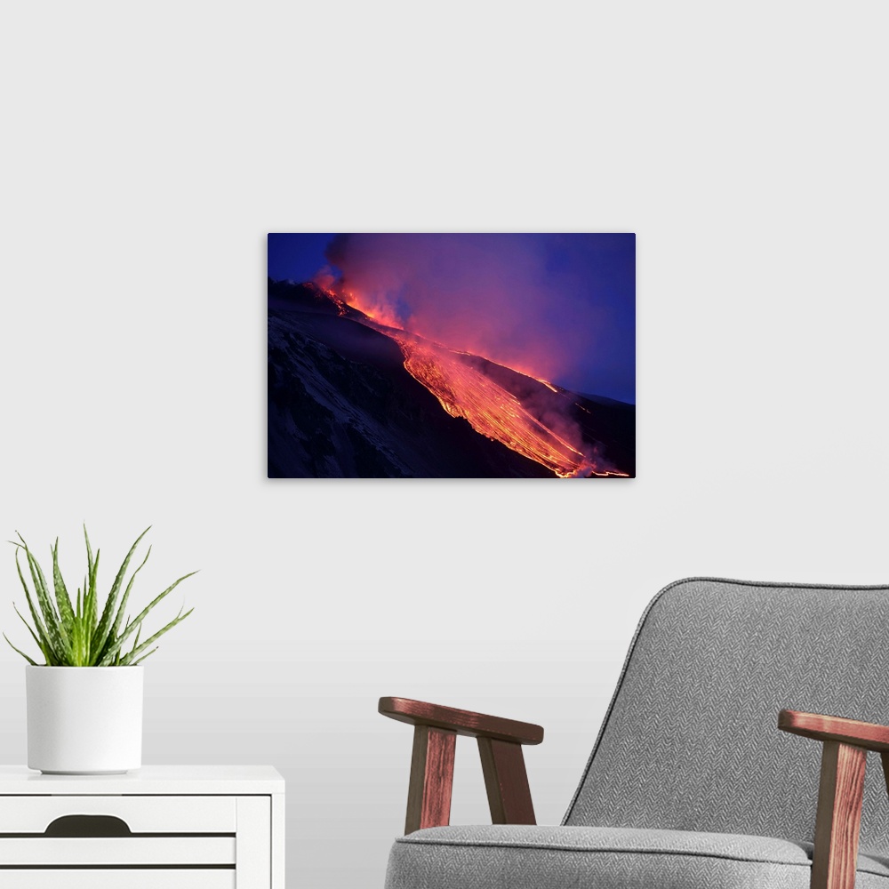 A modern room featuring Lava flowing into Valle del Bove at Mount Etna Volcano, Italy, following paroxysmal eruption.