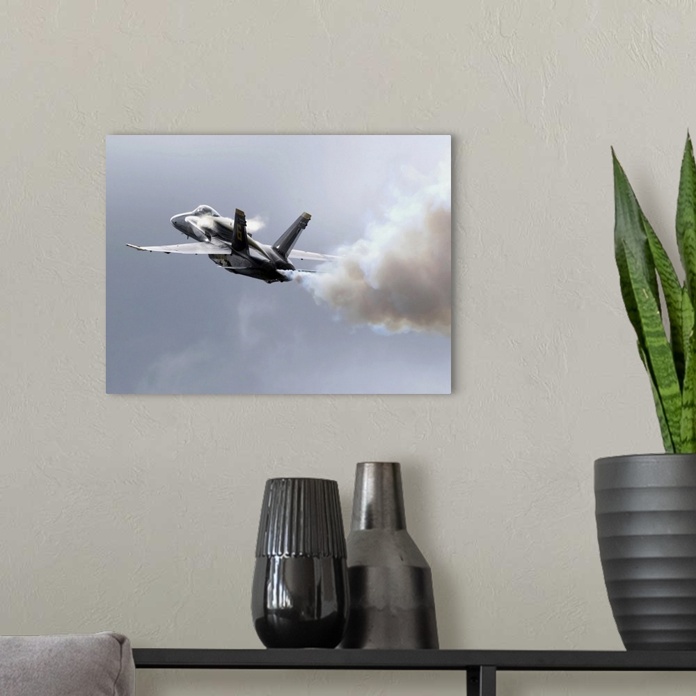 A modern room featuring Lead solo pilot of the Blue Angels demonstrates a section high alpha maneuver