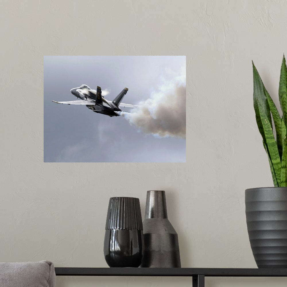 A modern room featuring Lead solo pilot of the Blue Angels demonstrates a section high alpha maneuver