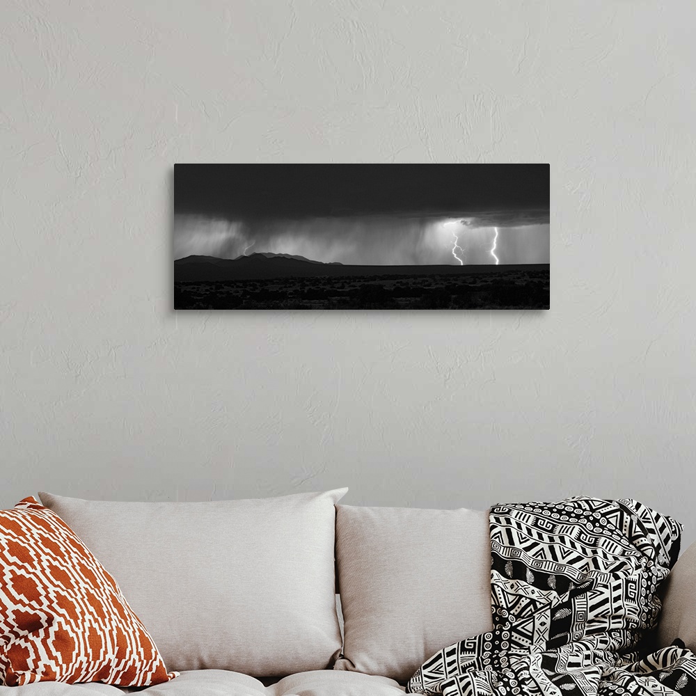 A bohemian room featuring Lightning storm over northern New Mexico plains