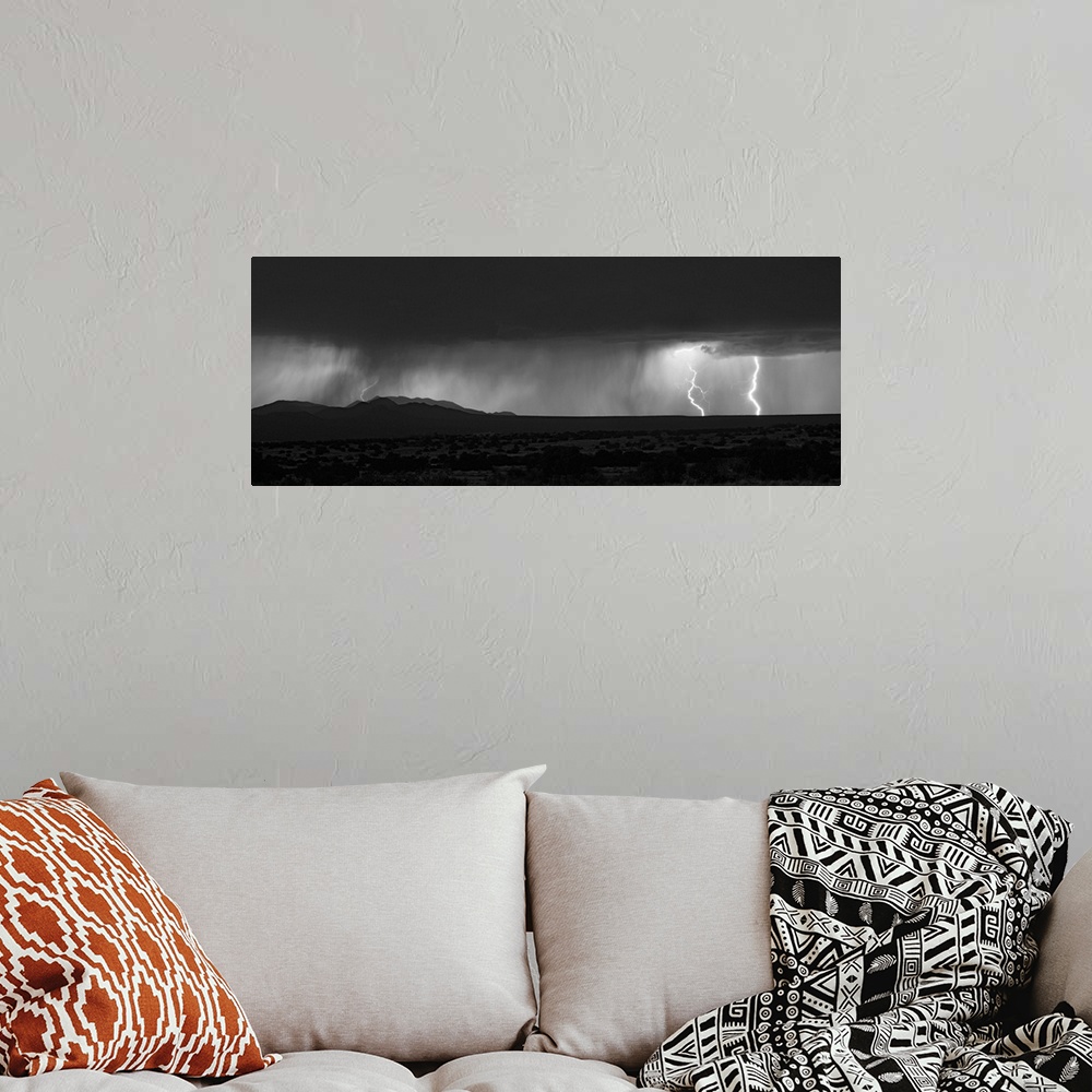 A bohemian room featuring Lightning storm over northern New Mexico plains