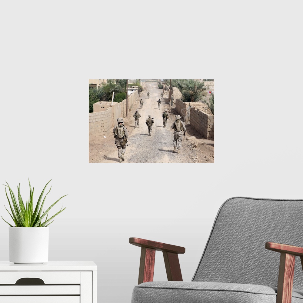 A modern room featuring Marines patrol the streets of Iraq.