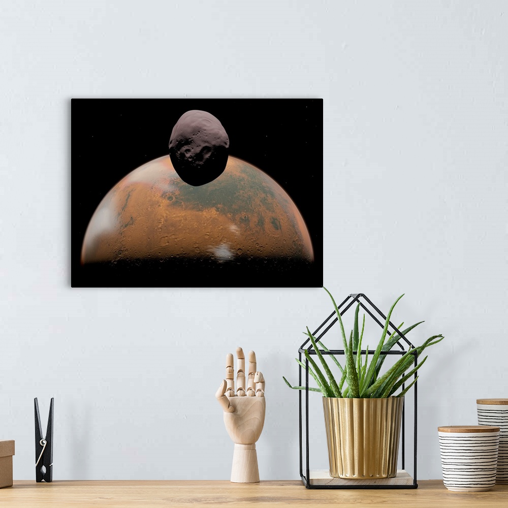 A bohemian room featuring Artist's concept of Mars and its tiny moon Phobos.