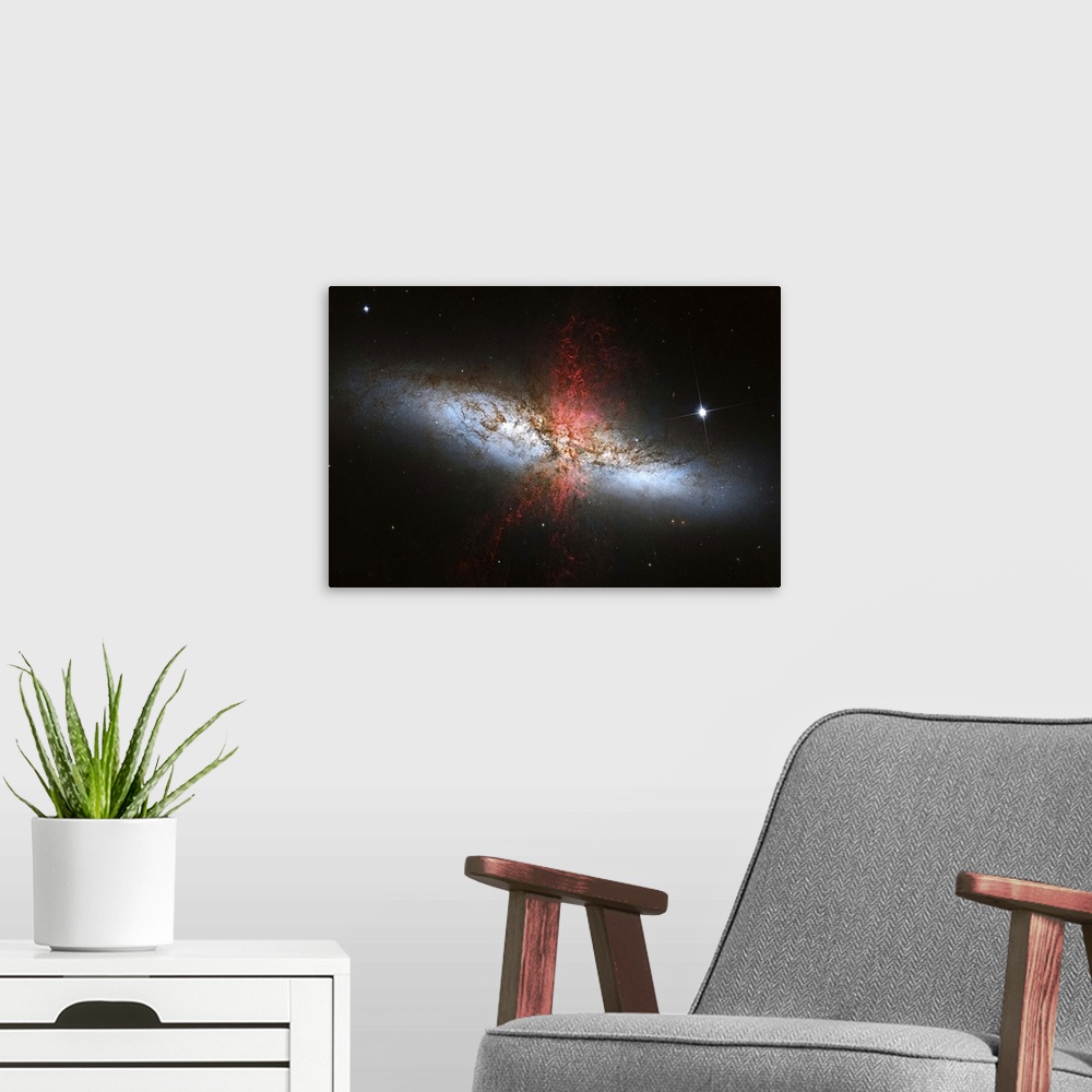 A modern room featuring Messier 82, a starburst galaxy in the constellation Ursa Major.