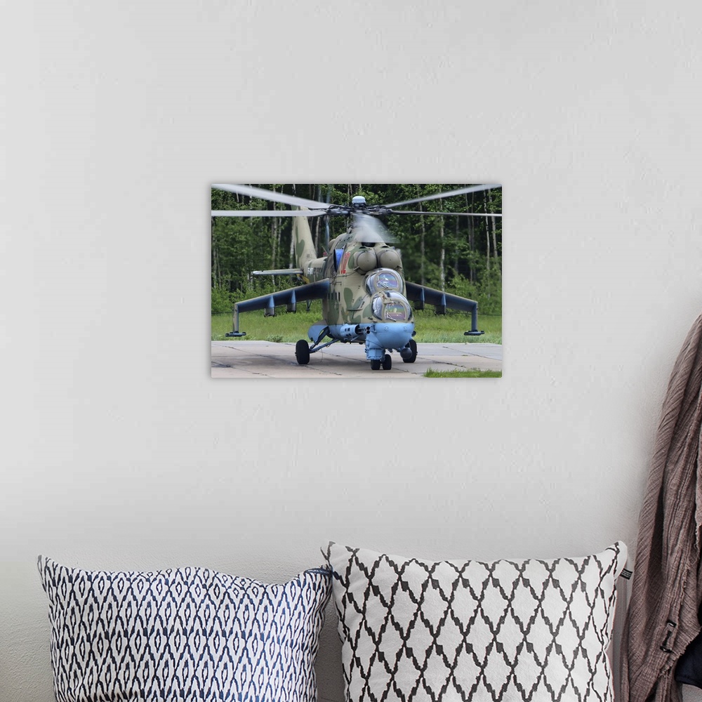 A bohemian room featuring Mil Mi-24P attack helicopter of the Russian Air Force, Torzhok, Russia.