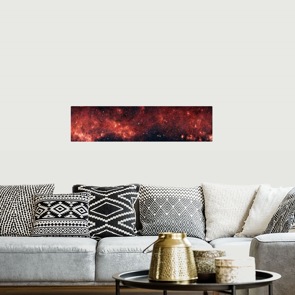 A bohemian room featuring Extremely panoramic shaped photograph of our native galaxy spread out across the sky.
