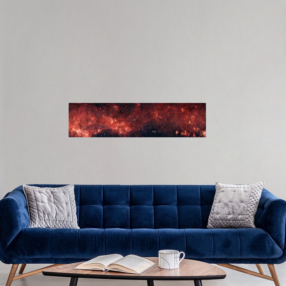 A modern room featuring Extremely panoramic shaped photograph of our native galaxy spread out across the sky.