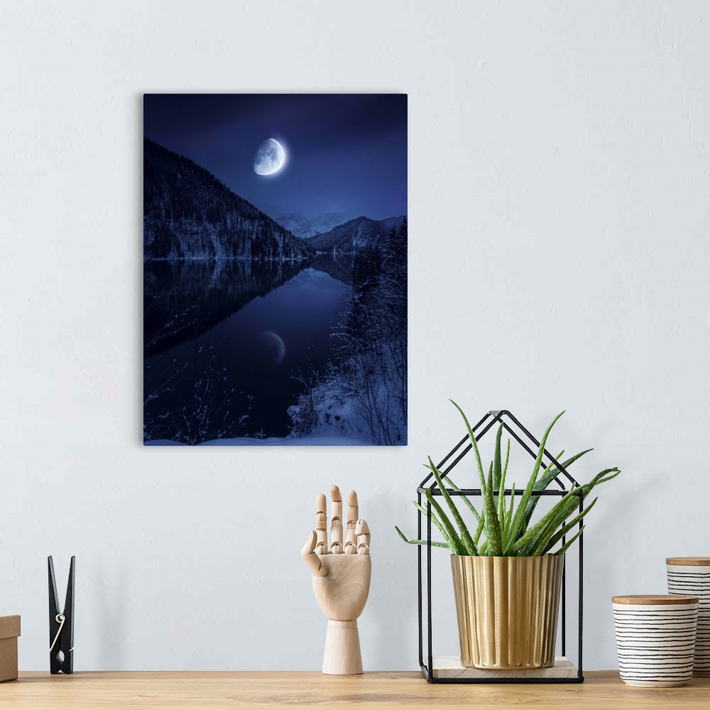 A bohemian room featuring Moon rising over tranquil lake in misty mountains.