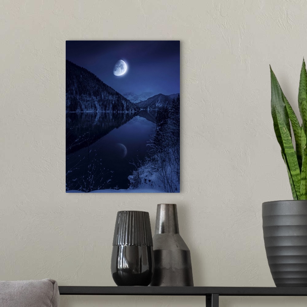 A modern room featuring Moon rising over tranquil lake in misty mountains.