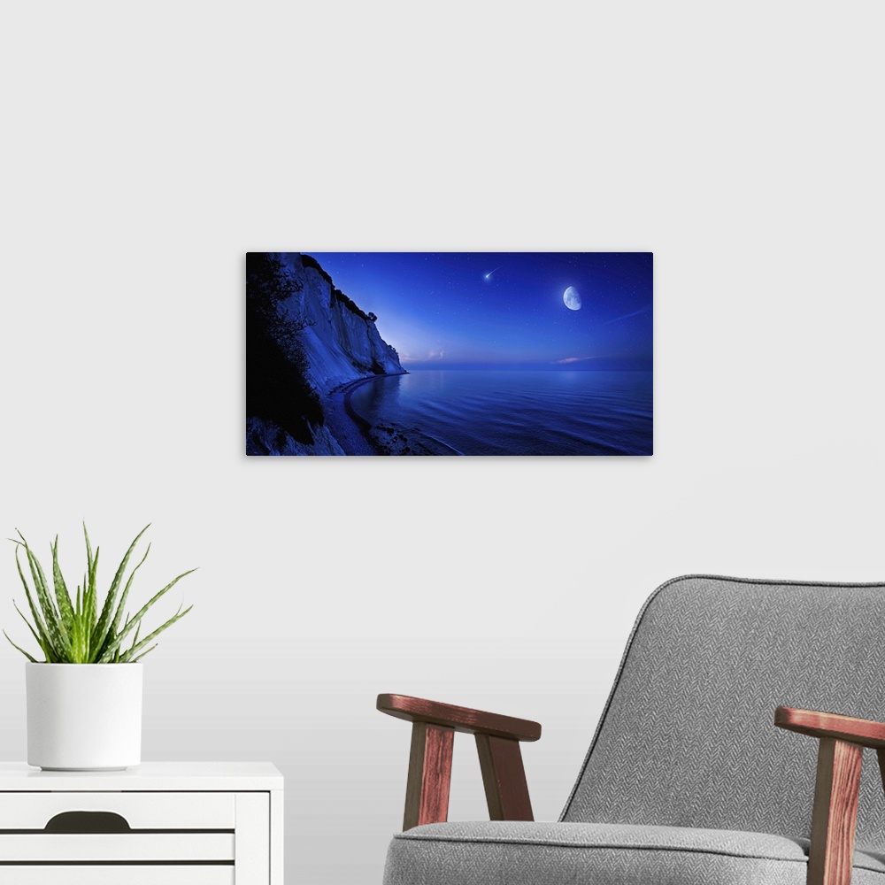 A modern room featuring Moon rising over tranquil sea and Mons Klint cliffs against starry sky with falling meteorite, De...