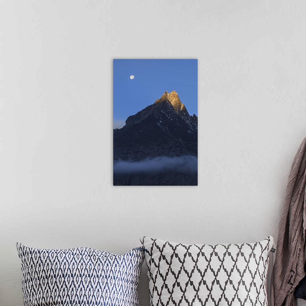 A bohemian room featuring Moonset and alpenglow over a snow peak in the Himalayas as seen from Sagarmatha National Park of ...