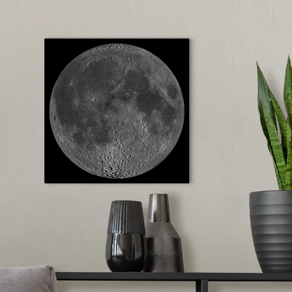A modern room featuring Square canvas photo of the up close view of the moon with crater details.