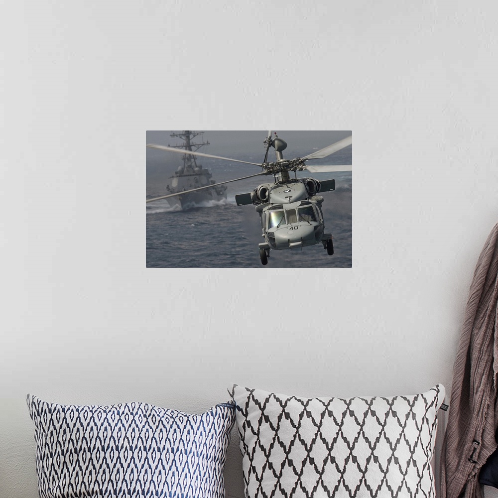 A bohemian room featuring Pacific Ocean, January 2, 2012 - An MH-60S Knight Hawk passes the Arleigh Burke-class guided-miss...