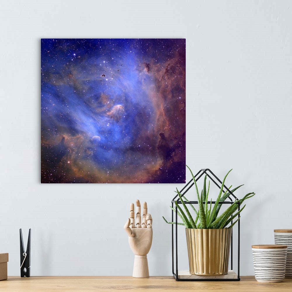 A bohemian room featuring Photograph of stars and nebula's in outer space.
