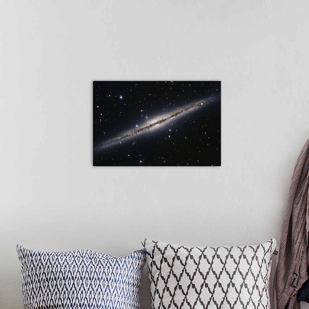 A bohemian room featuring NGC 891, an edge-on spiral galaxy in Andromeda.