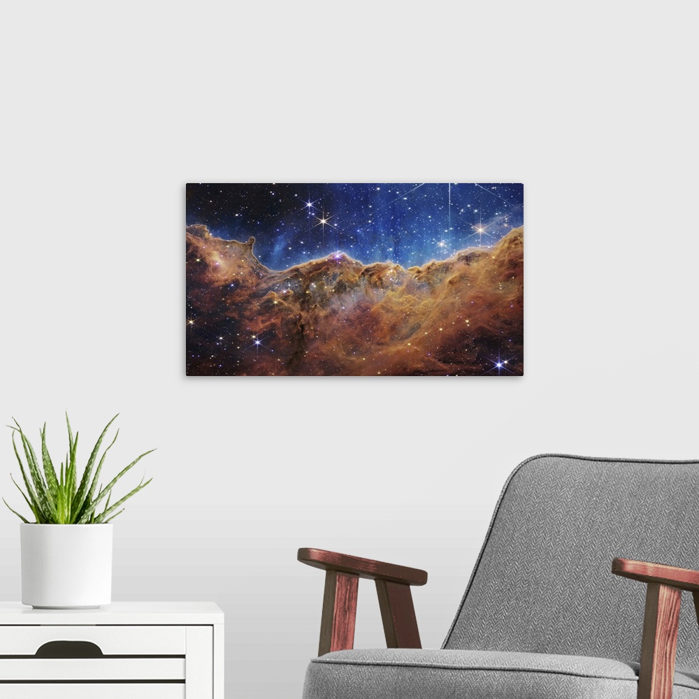 A modern room featuring A nearby, young, star-forming region NGC 3324 in the Carina Nebula. Captured in infrared light by...